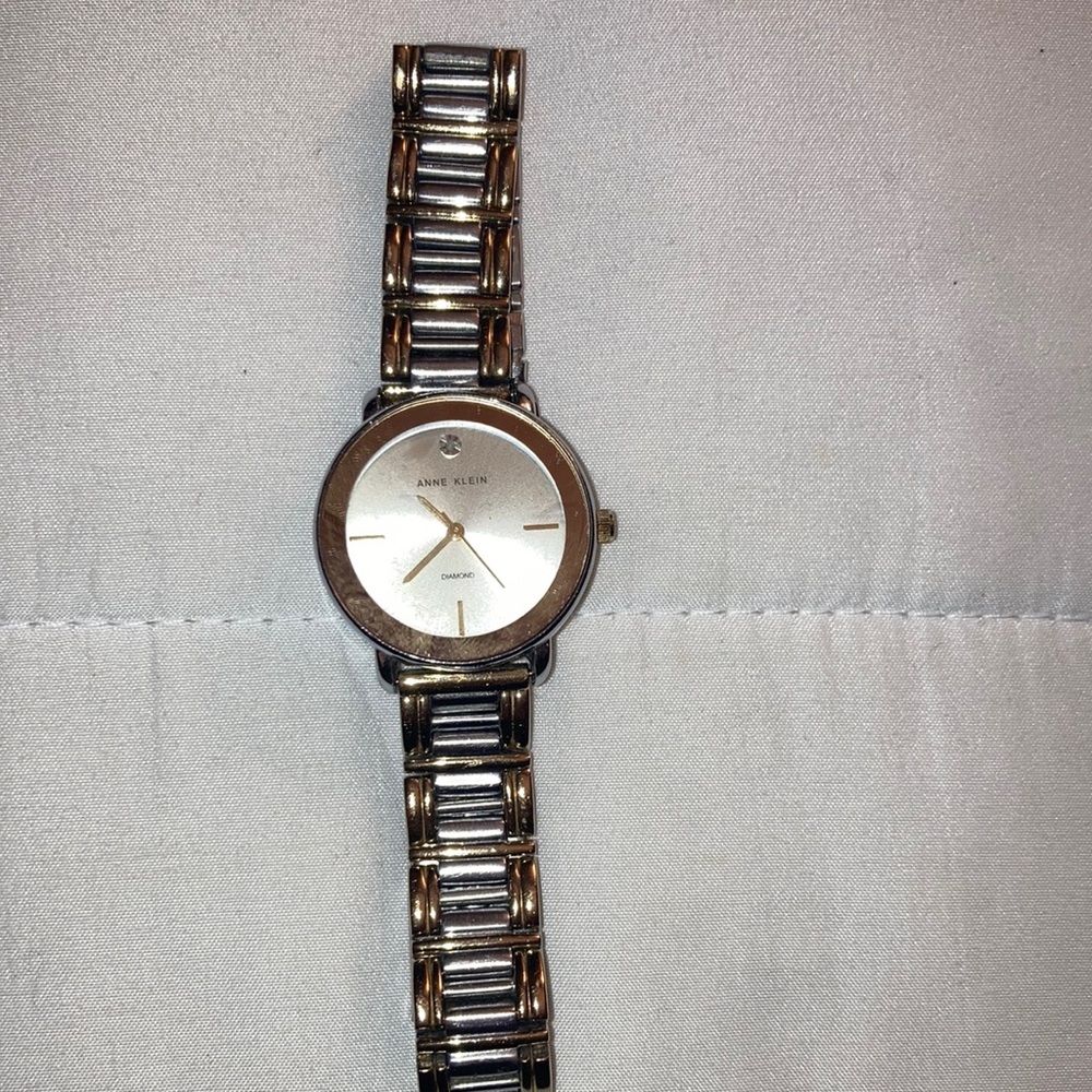 Anne Klein Women’s genuine diamond dial bracelet watch